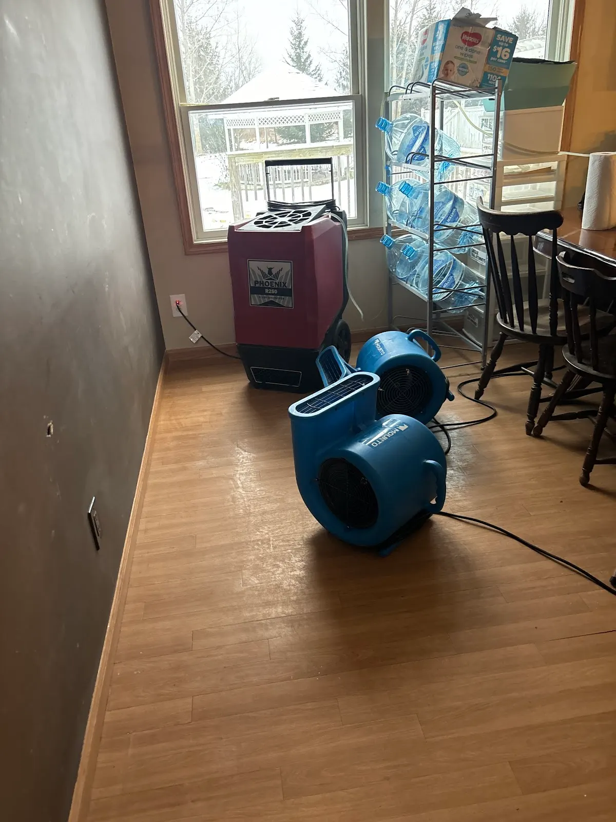 Doan Restoration air mover drying a water-damaged room